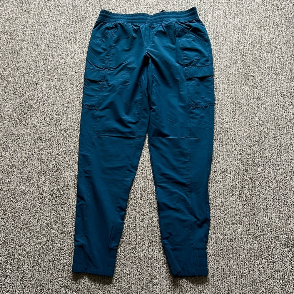 The North Face joggers, size 8, teal blue in color.
